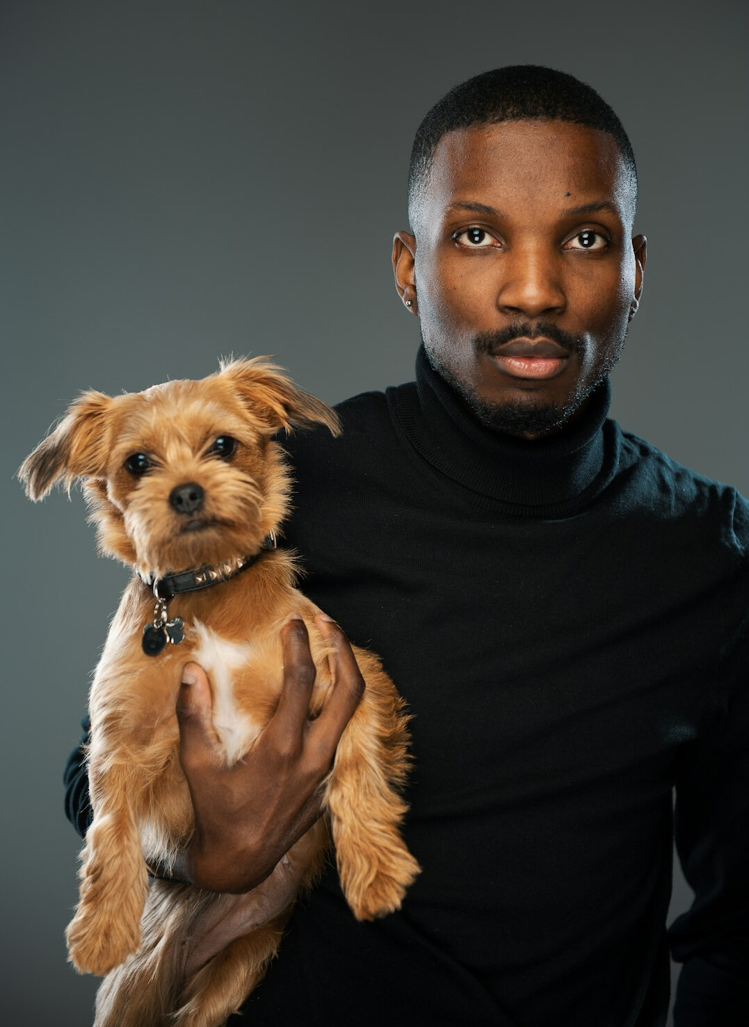 Studio portrait of a young male real estate advisor
